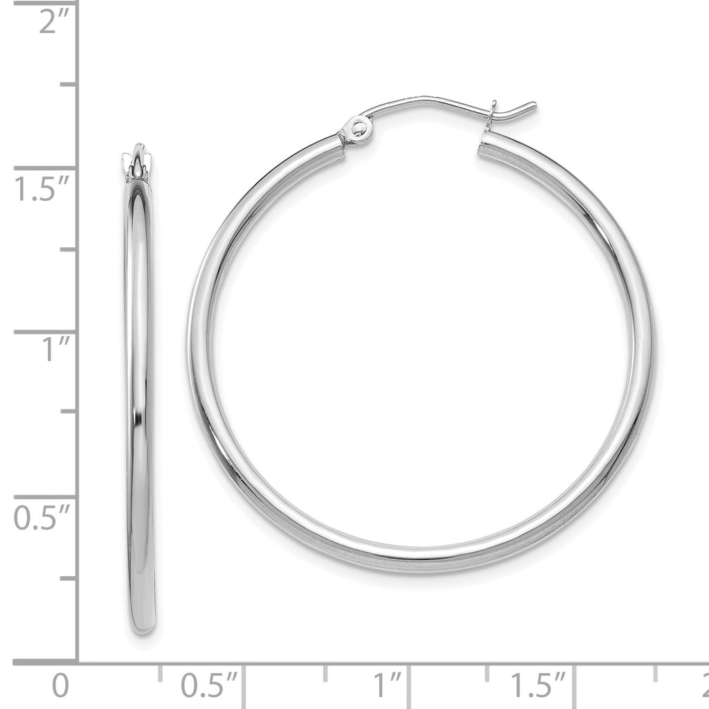 14K white gold polished medium hoop earrings.