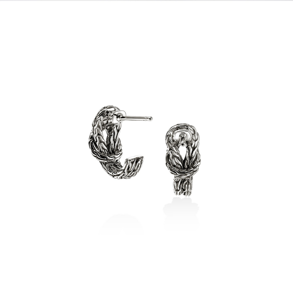 Sterling silver polished J hoop earrings.