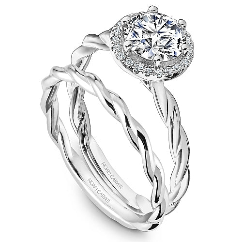 Twisted band halo diamond engagement ring.