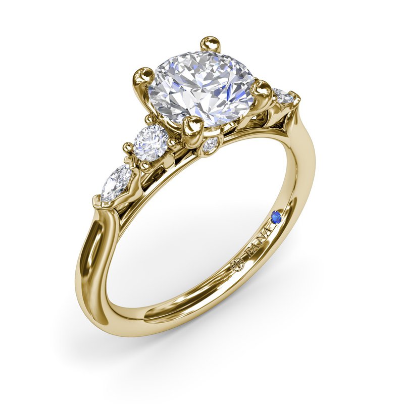 Yellow gold ring with side diamonds.