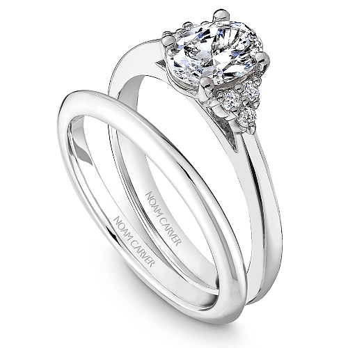 14K white gold ring with round diamonds.
