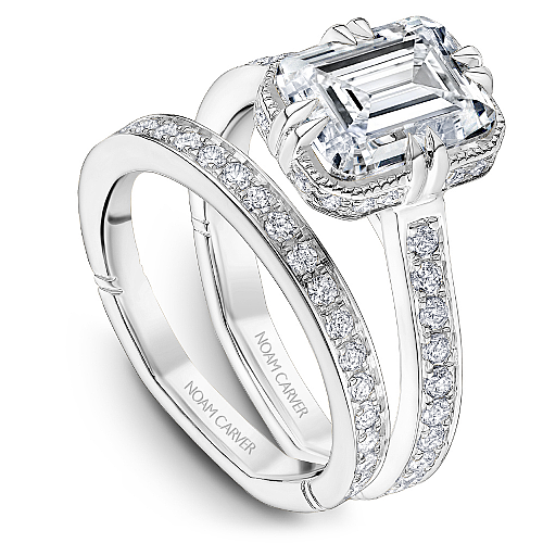 14K white gold diamond halo ring.