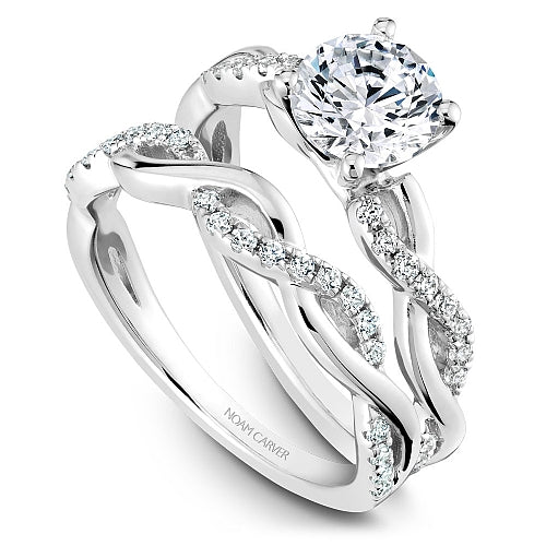 White gold ring with diamond accents.