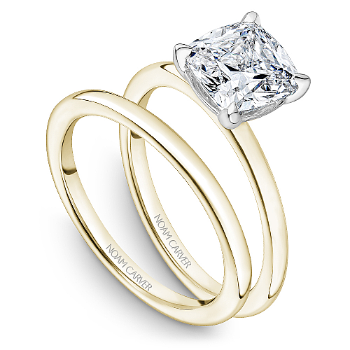 Solitaire diamond ring, yellow gold band.