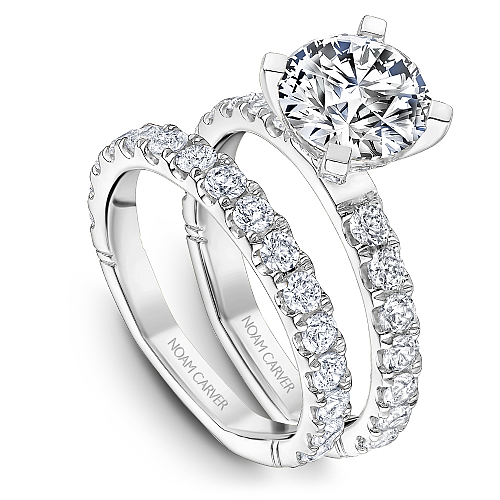 14K white gold ring with round diamonds.