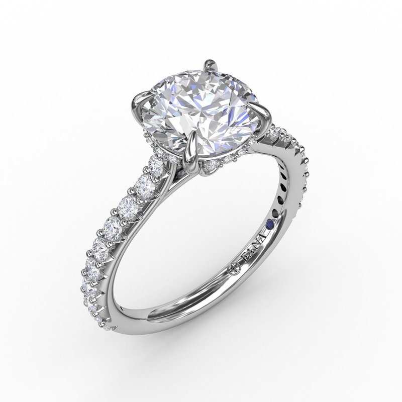 14K white gold ring with round diamonds.