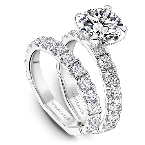 14K white gold ring with round diamonds.