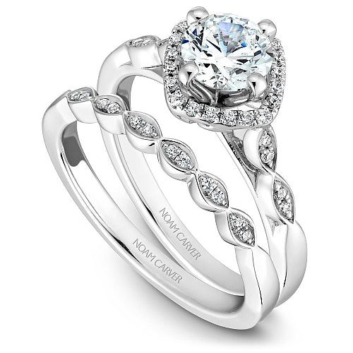 Halo diamond ring with twisted band design.