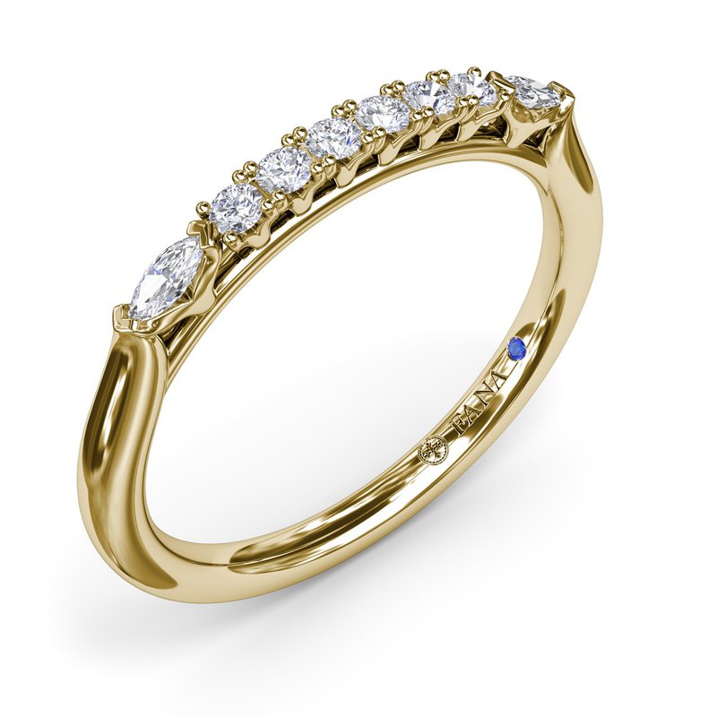 14K yellow gold band with various diamonds.