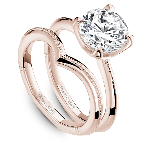 Rose gold ring with round diamond accents.