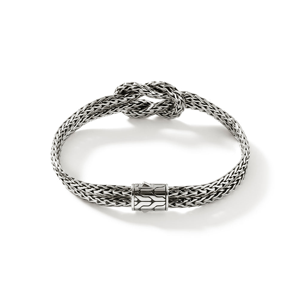 Sterling silver woven knot bracelet.