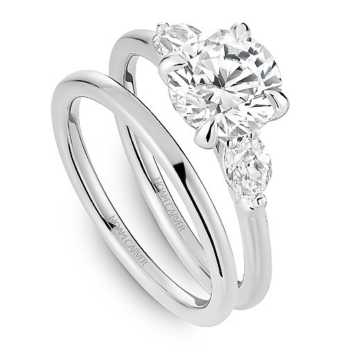 Oval diamond three-stone white gold ring.