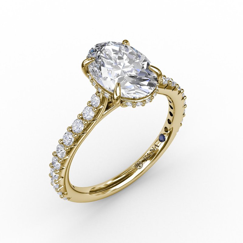 Yellow gold ring with round diamond accents.