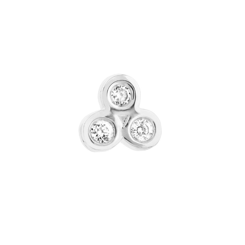 Three round diamonds in white gold cluster.