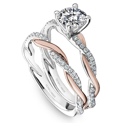 White and rose gold diamond ring setting.