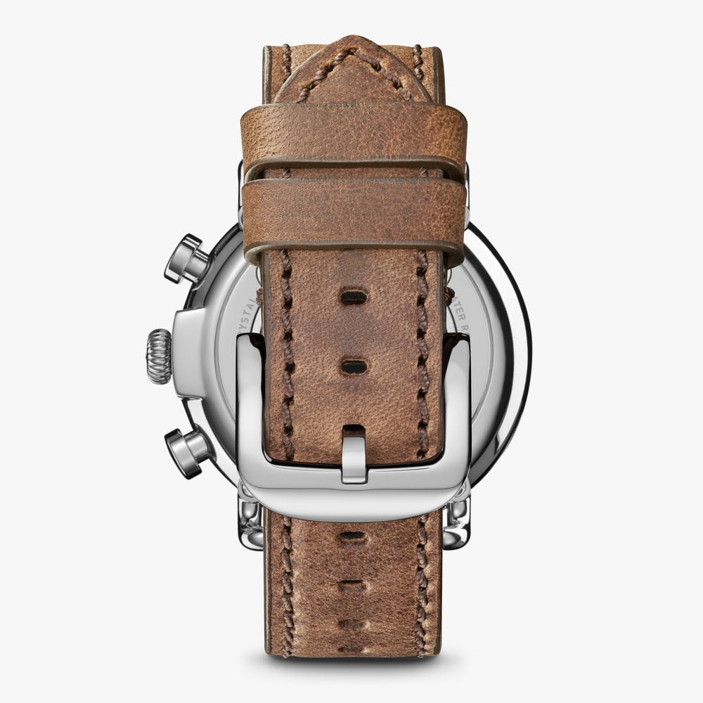 Brown leather watch strap with stainless steel buckle.
