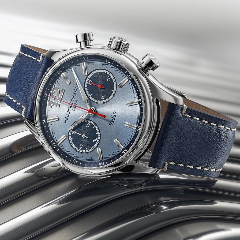 Light blue dial, stainless steel case, blue leather band.
