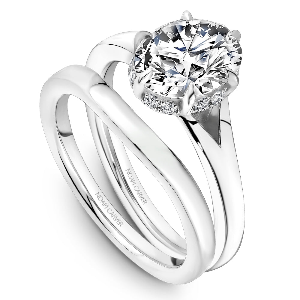 14K white gold solitaire engagement ring.