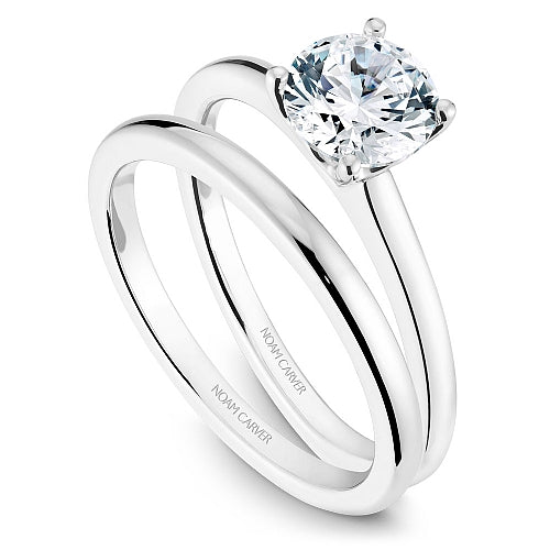 14K white gold solitaire engagement ring.