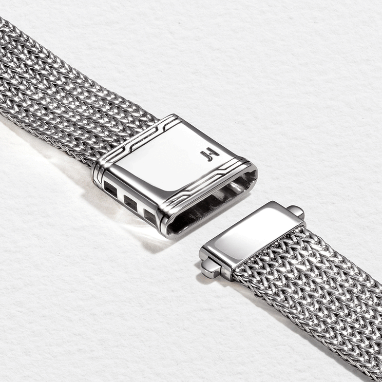 Sterling silver polished mesh watch band.