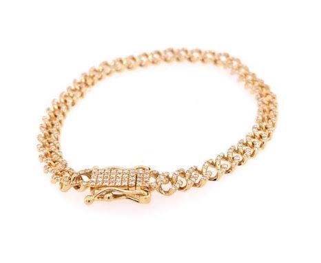 Diamond Cuban link bracelet in yellow gold.