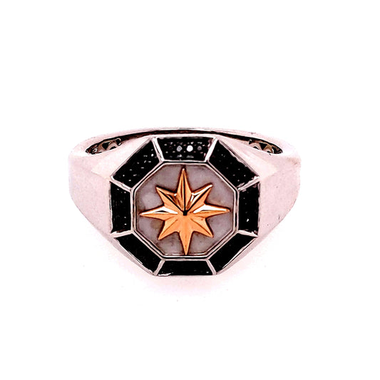 Sterling silver ring with star design.
