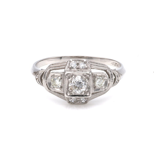 Vintage platinum ring with three diamonds.