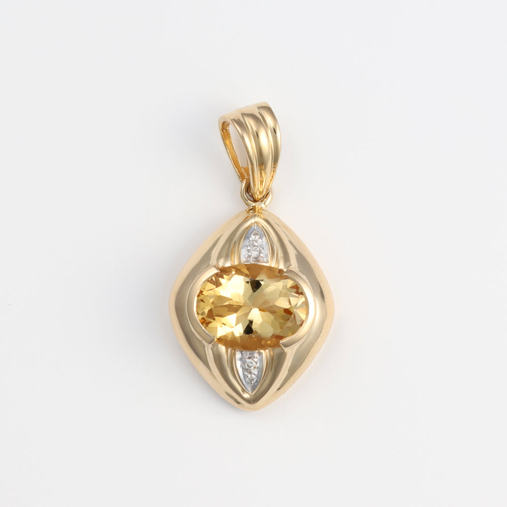 18K gold pendant with oval citrine.