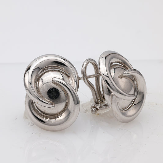 18K white gold swirl button earrings.