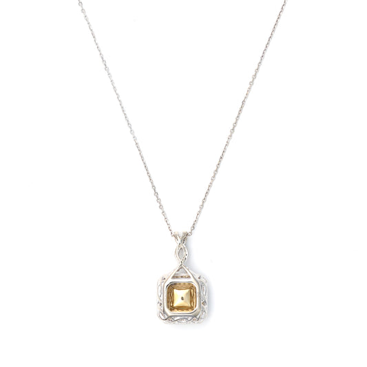 Asscher-cut yellow sapphire pendant necklace.