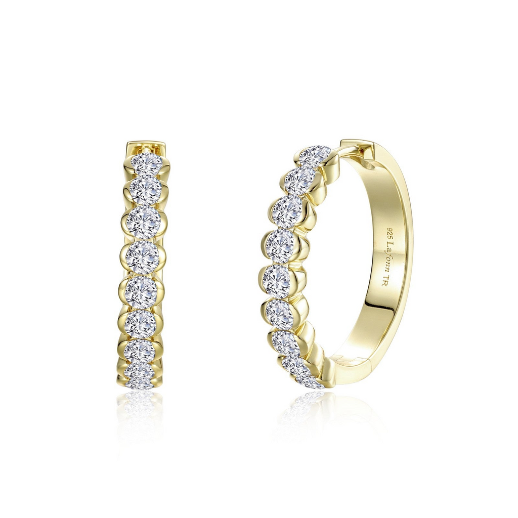 Yellow sterling silver hoop earrings with simulated diamonds.