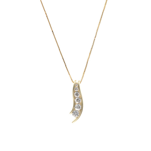 Gold necklace with curved diamond pendant.