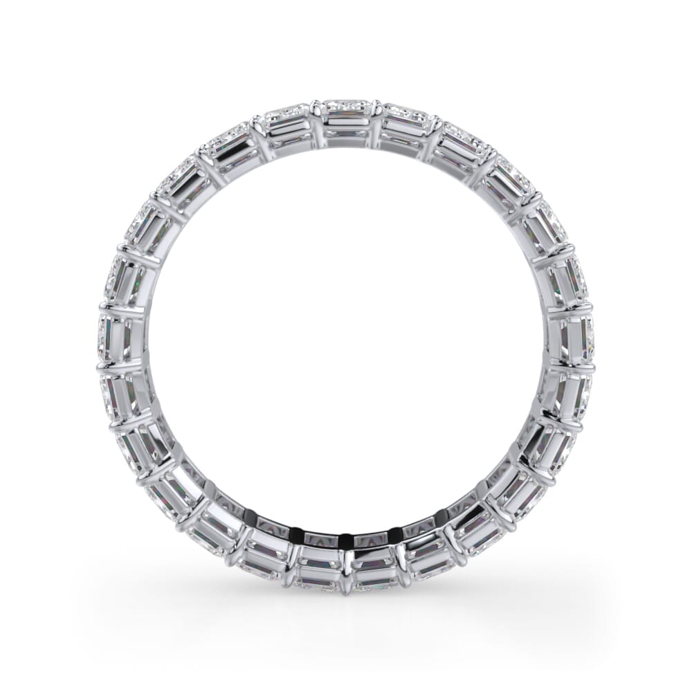 Emerald-cut diamond eternity band in white gold.