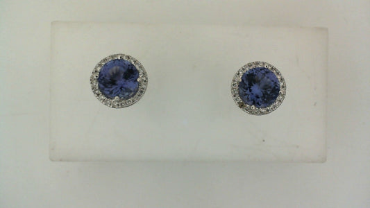Round tanzanite stud earrings with diamonds.