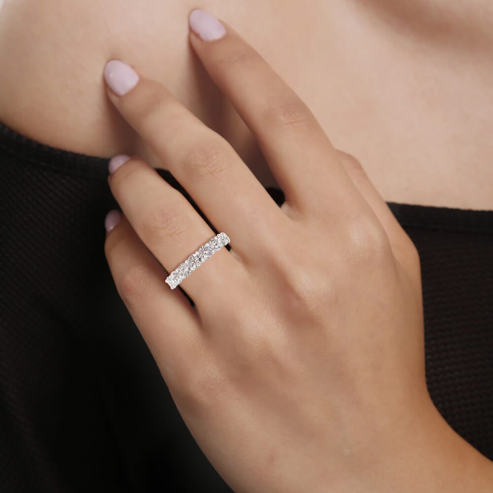 14K white gold diamond band on hand.