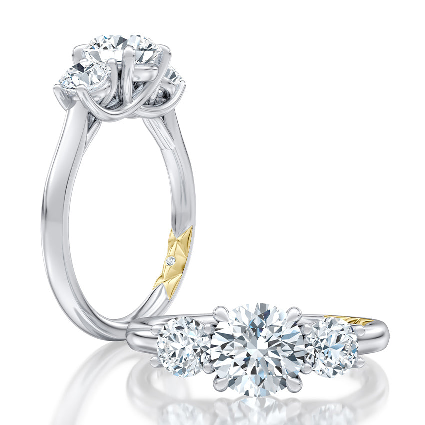Three-stone diamond ring, white gold band.