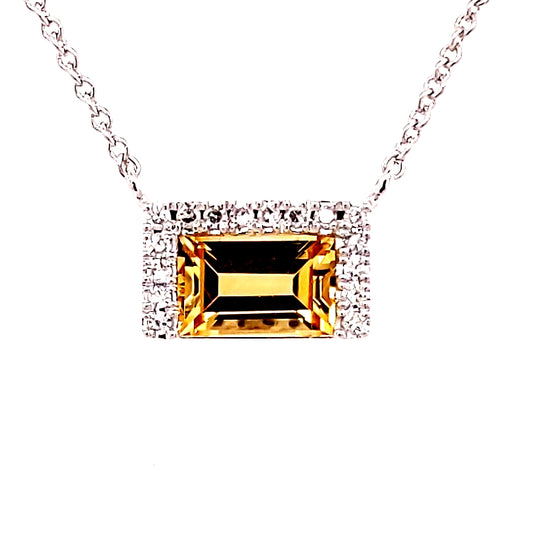 Emerald citrine necklace with diamond accents.