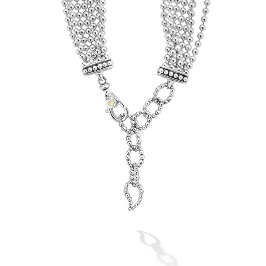 Sterling silver multi-strand layered necklace.