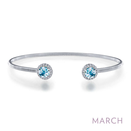 Platinum bangle with aquamarines and diamonds.