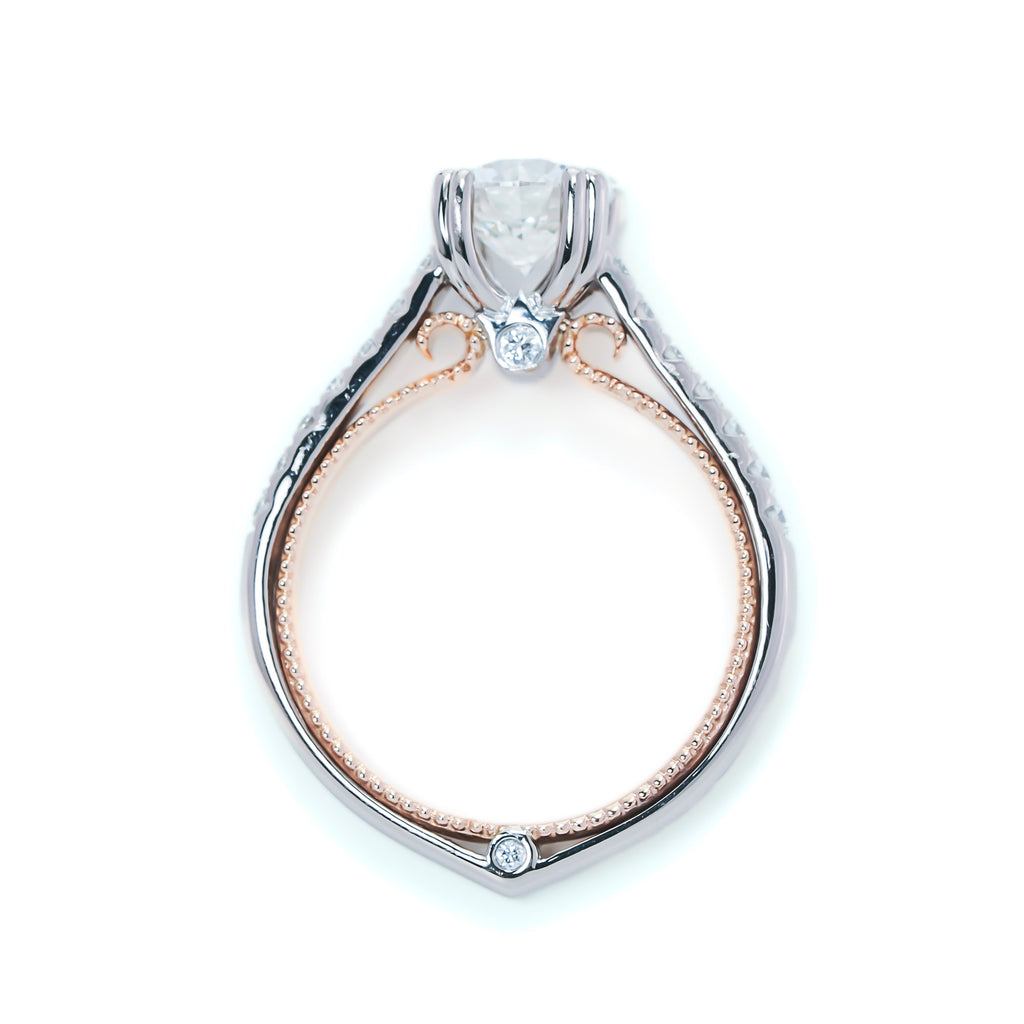 White-rose diamond engagement ring with hidden accents.