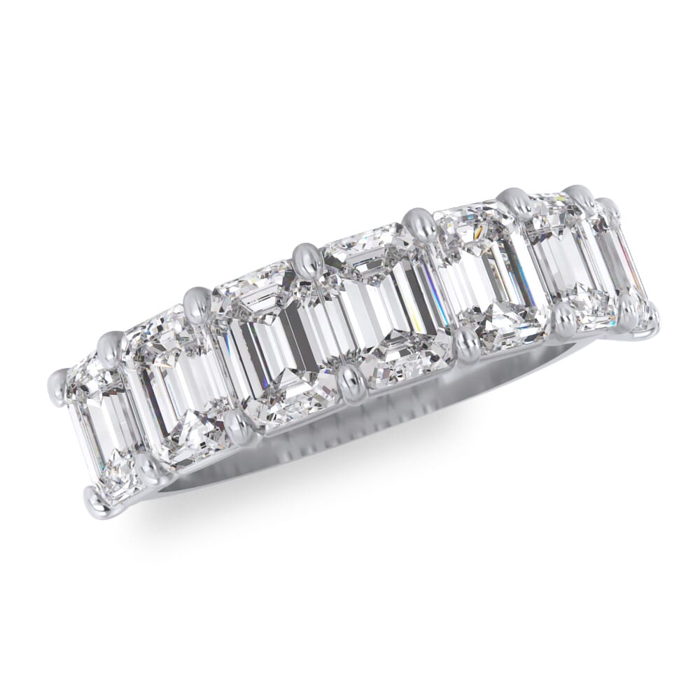 Emerald diamond wedding band in white gold.