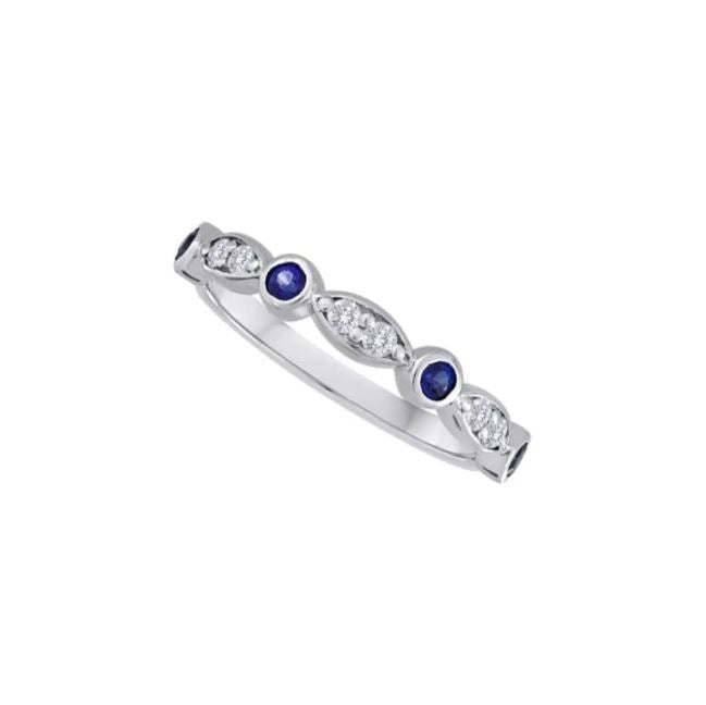 14K white gold band with sapphires.