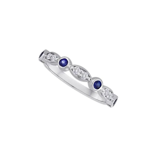 14K white gold band with sapphires.