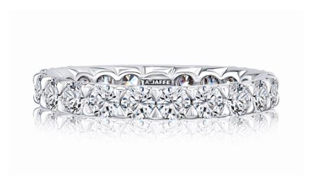 14K white gold band with round diamonds.