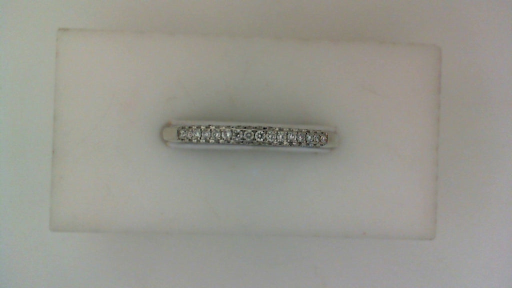 White gold band with round lab-grown diamonds.
