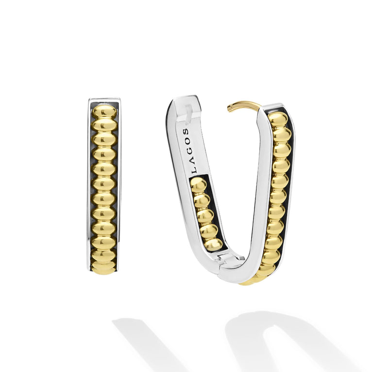 Sterling silver oval hoops with gold beads.