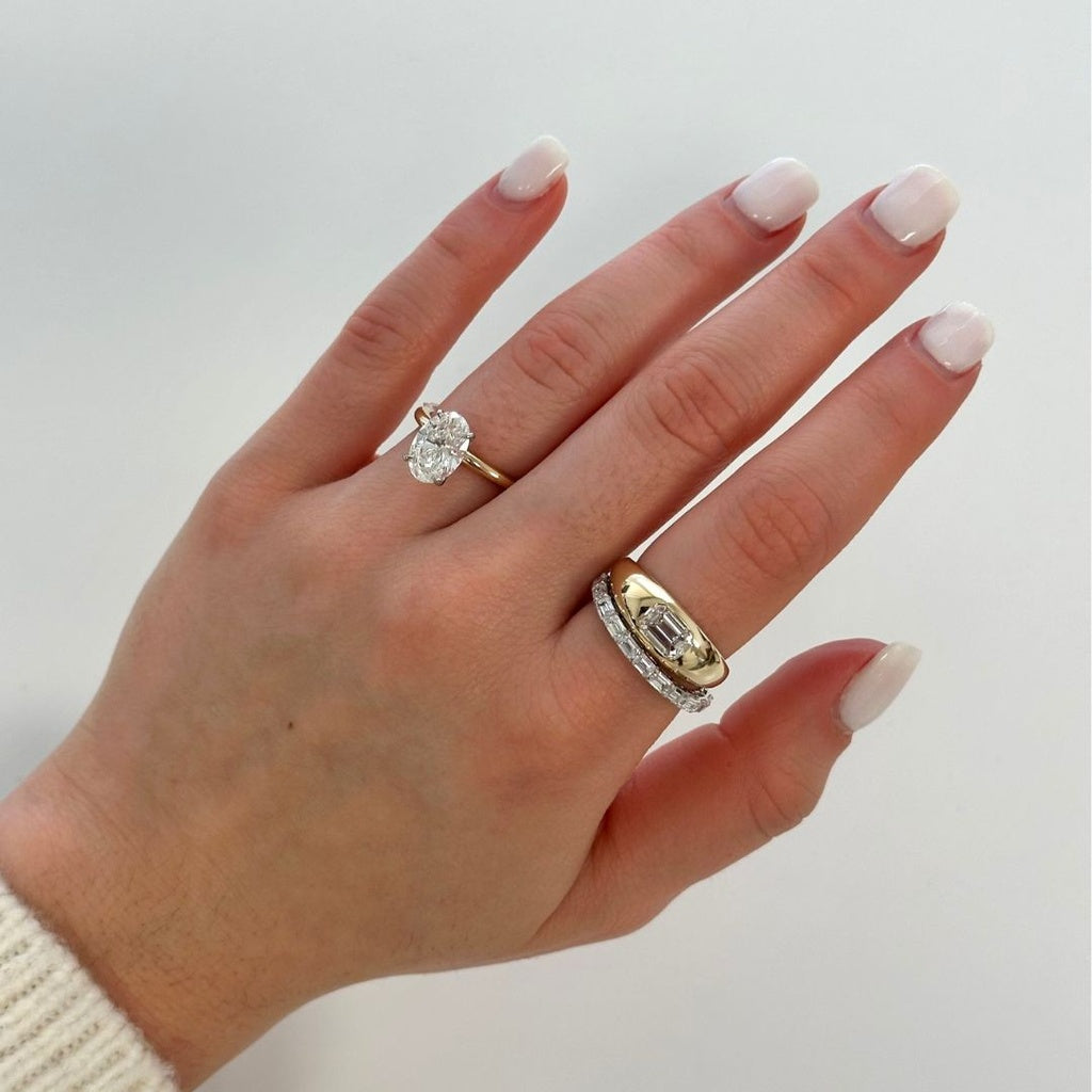14K yellow gold ring with emerald diamond.