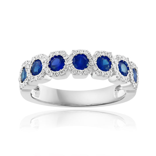 Seven-sapphire white gold band with diamonds.