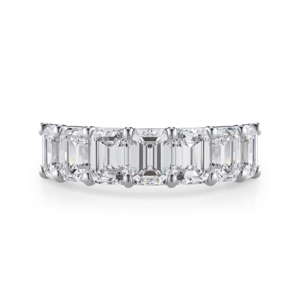 Emerald diamond wedding band in white gold.