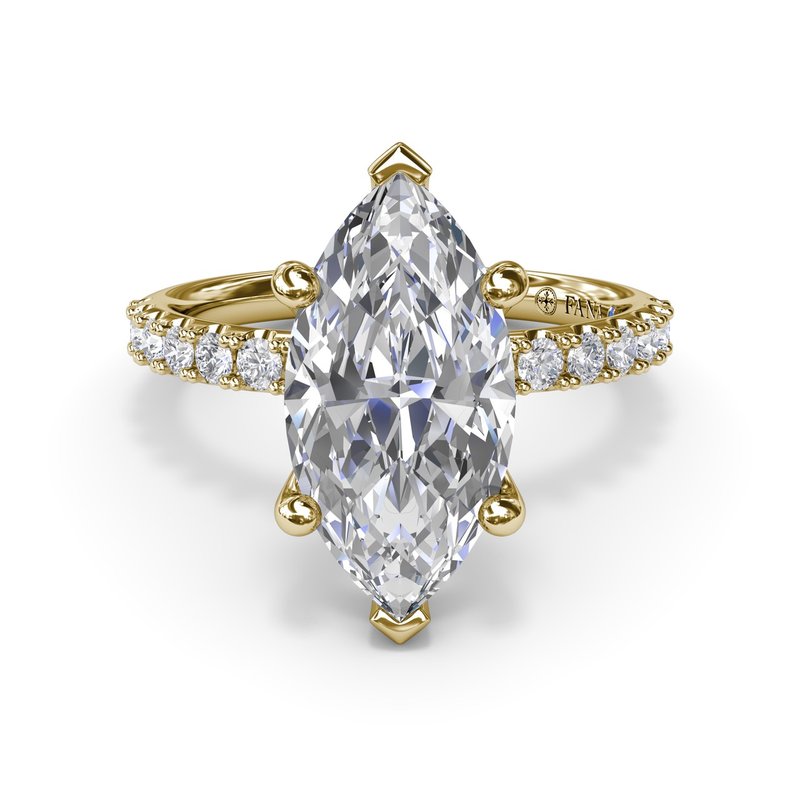 Marquise diamond ring with gold band.